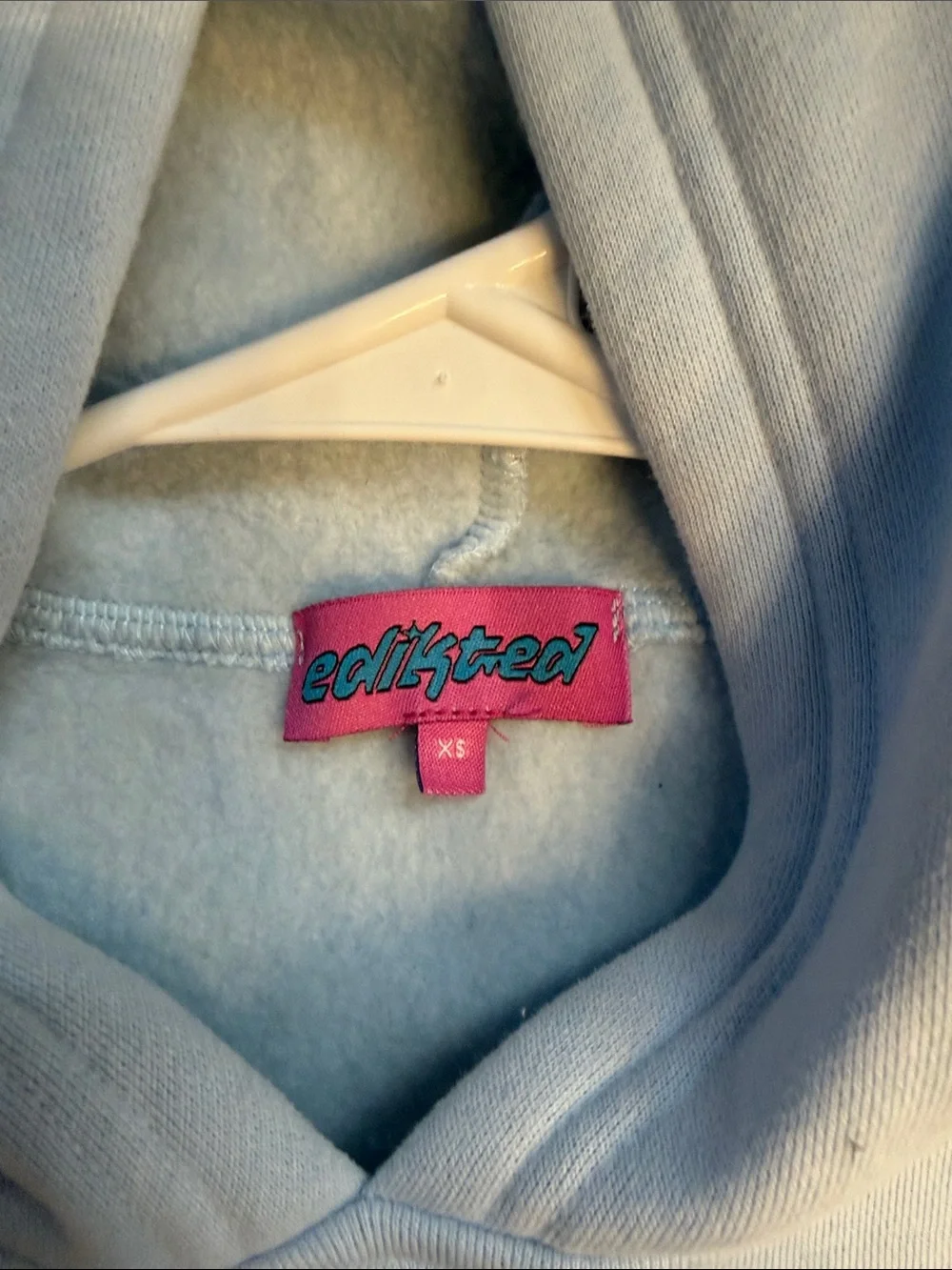 Edikted Light Blue Hoodie with Navy Bow Sleeve Graphics